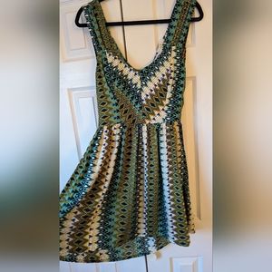 Green patterned open tie back dress